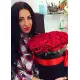 51 червона троянда у капелюшної коробці